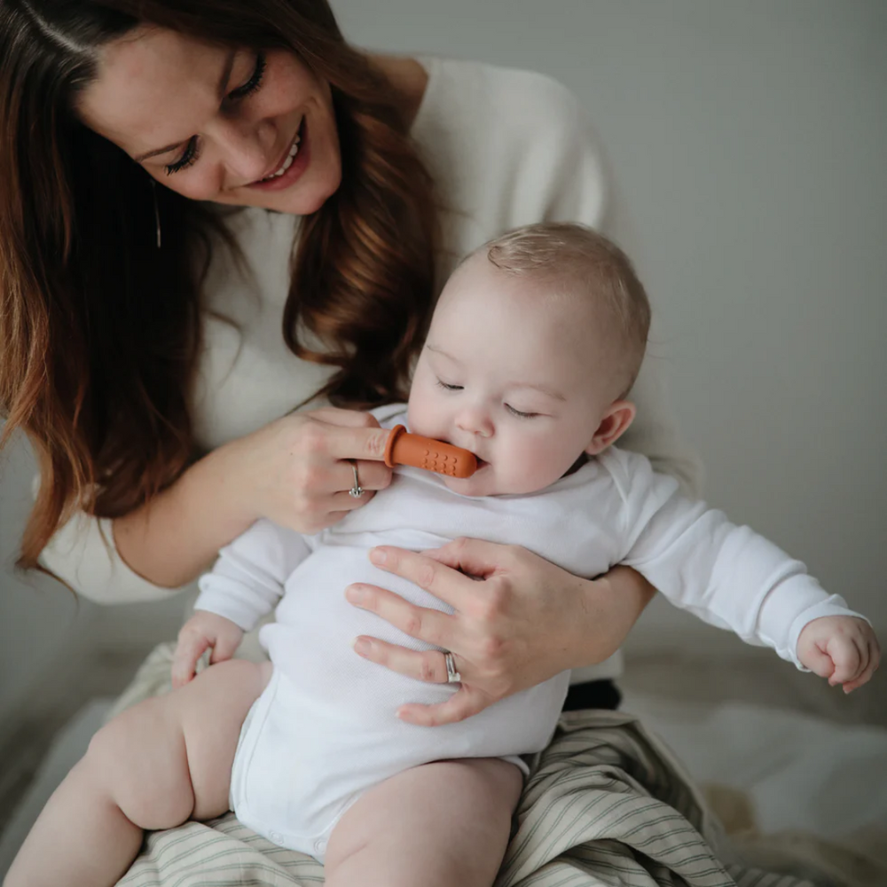 Brosse à dents à doigt - argile/sable mouvant