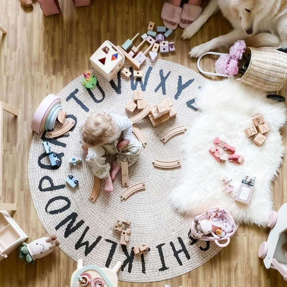 Tapis rond en vinyle - Alphabet