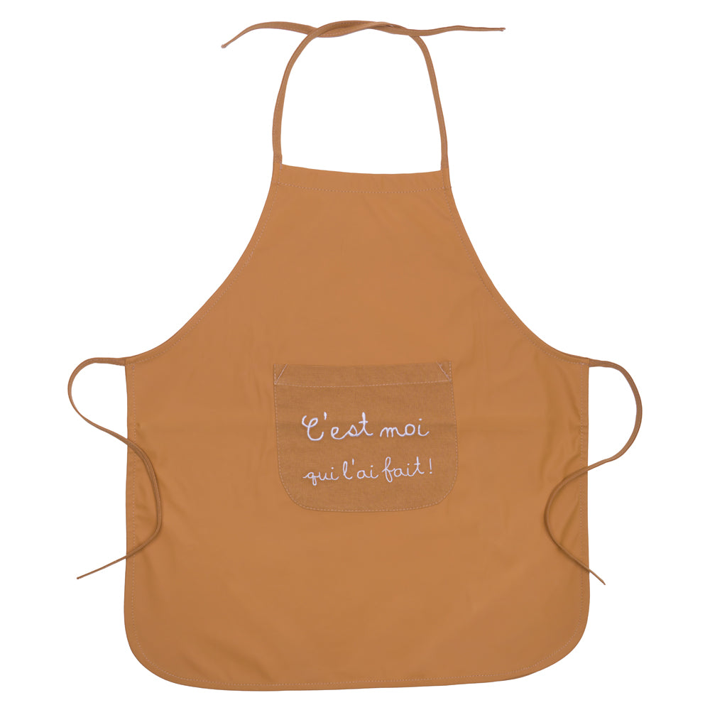 Tablier de cuisine “C’est moi qui l’ai fait” en tissu imperméable camel